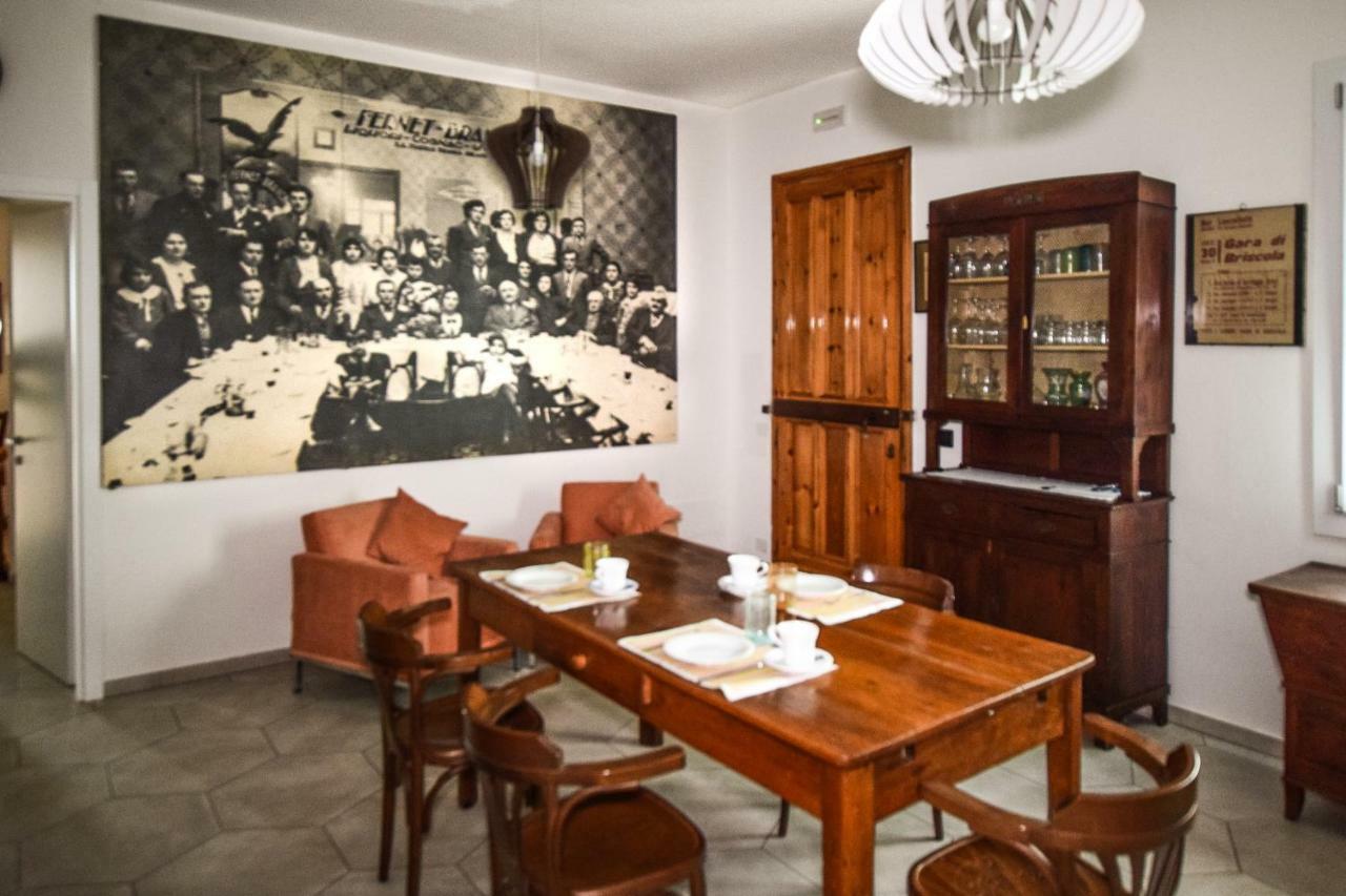 gambisa street Hotel Soliera Bagian luar foto